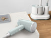 EAN 3121040089828 - Tefal Origin Travel DT1034 Vaporizador manual de prendas 0,07 L 1200 W Verde claro, Blanco imagen 5