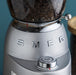 EAN 8017709339883 - Smeg CGF02SSEU molinillo de café 150 W Aluminio imagen 18